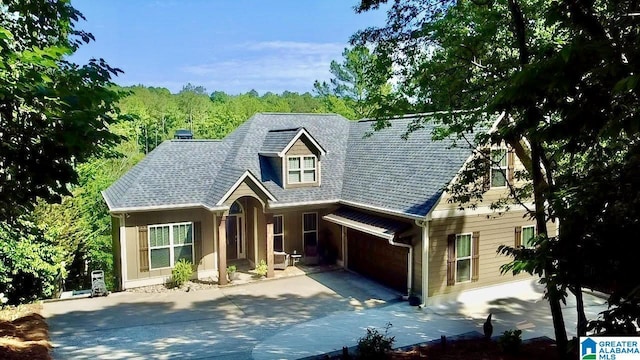 567 Brookwater Way, Wedowee, AL 36278 - view of front of house featuring concrete driveway, a garage, and a shingled roof