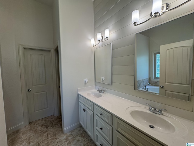 567 Brookwater Way, Wedowee, AL 36278 - full bathroom featuring double vanity, a garden tub, and baseboards