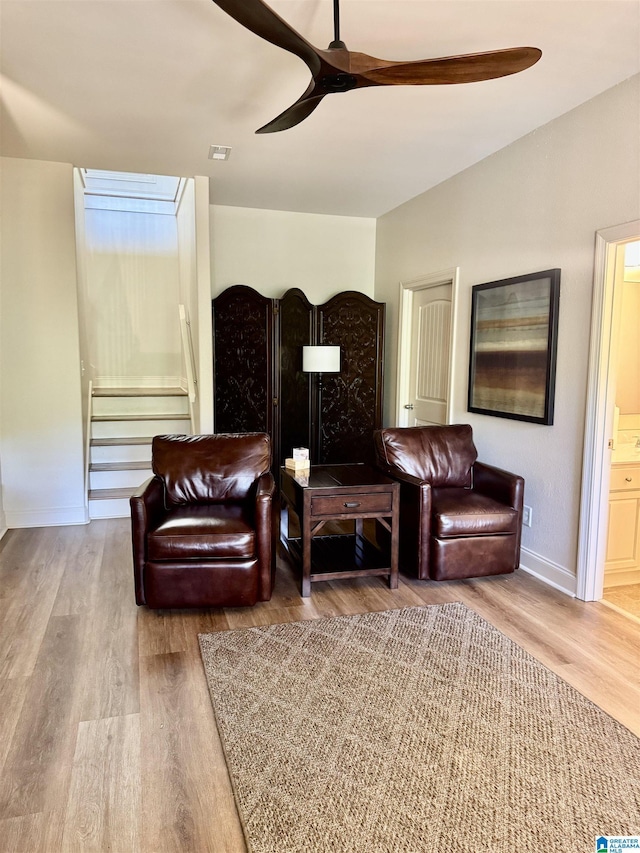 567 Brookwater Way, Wedowee, AL 36278 - sitting room with wood finished floors, baseboards, a ceiling fan, and stairway