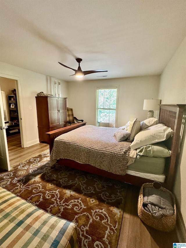 567 Brookwater Way, Wedowee, AL 36278 - bedroom with wood finished floors and ceiling fan