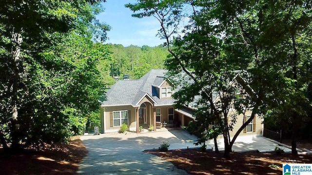 567 Brookwater Way, Wedowee, AL 36278 - view of property hidden behind natural elements with concrete driveway and a wooded view