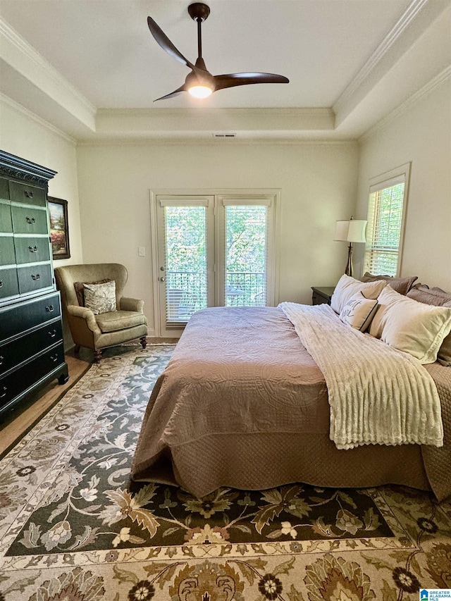 567 Brookwater Way, Wedowee, AL 36278 - bedroom with access to outside, crown molding, a tray ceiling, and ceiling fan