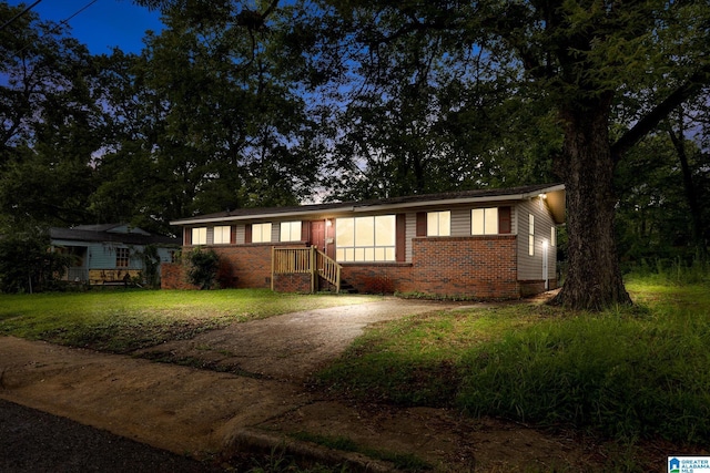1232 Frisco St, Birmingham, AL 35224 - ranch-style home with brick siding and a front lawn