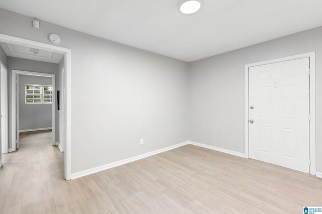 1232 Frisco St, Birmingham, AL 35224 - spare room with light wood-type flooring, baseboards, and a smoke detector
