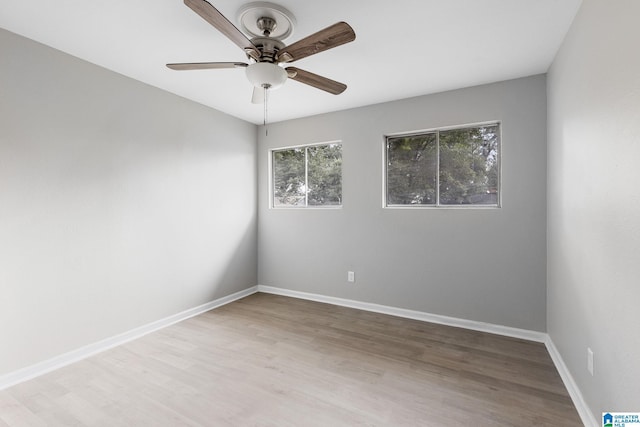 1232 Frisco St, Birmingham, AL 35224 - empty room with ceiling fan, wood finished floors, and baseboards