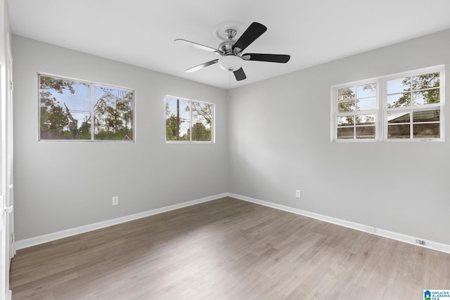 1232 Frisco St, Birmingham, AL 35224 - empty room featuring baseboards, a ceiling fan, and wood finished floors