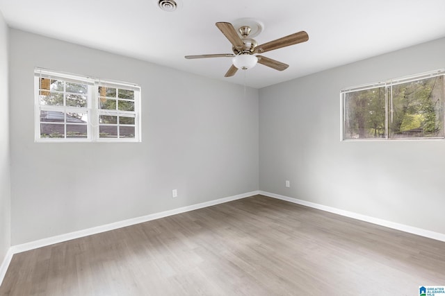 1232 Frisco St, Birmingham, AL 35224 - unfurnished room with wood finished floors, baseboards, and ceiling fan