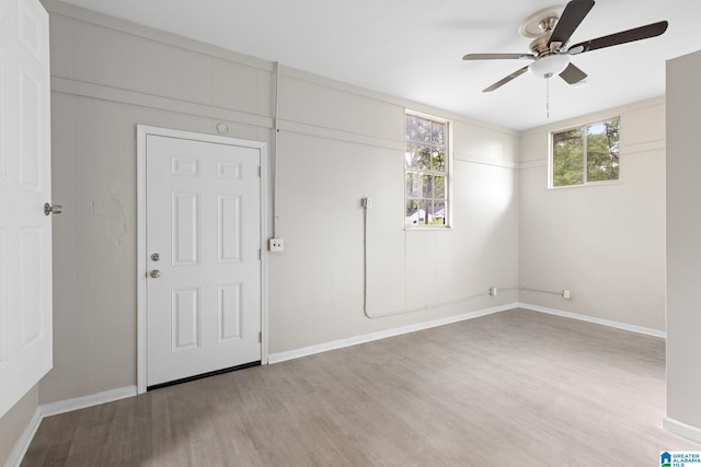 1232 Frisco St, Birmingham, AL 35224 - unfurnished bedroom with wood finished floors, baseboards, and a ceiling fan