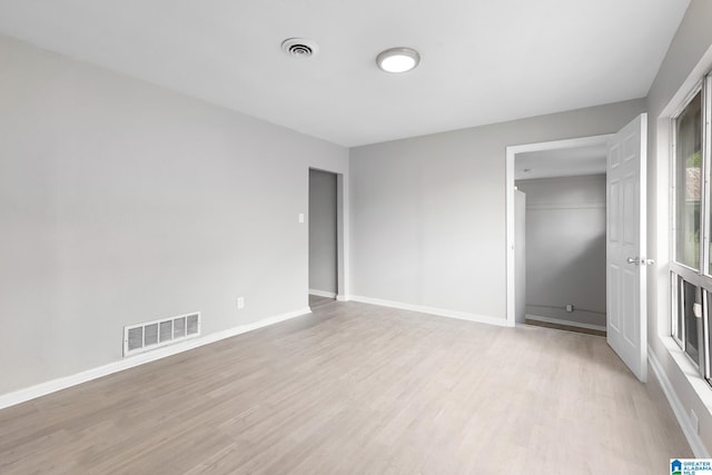 1232 Frisco St, Birmingham, AL 35224 - empty room with light wood-style flooring and baseboards