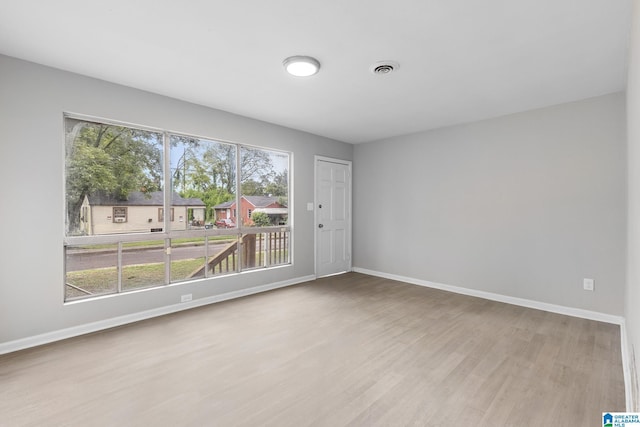 1232 Frisco St, Birmingham, AL 35224 - spare room featuring wood finished floors and baseboards