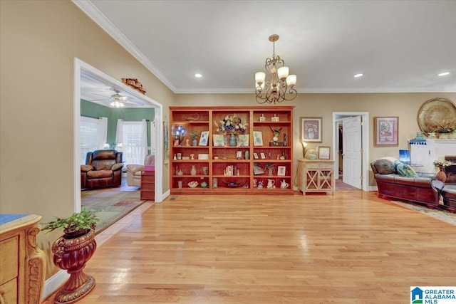 617 Golden Eagle Cir, Jasper, AL 35504 - dining area featuring light wood-style flooring, crown molding, recessed lighting, a chandelier, and baseboards
