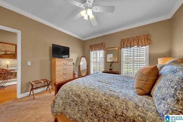 617 Golden Eagle Cir, Jasper, AL 35504 - carpeted bedroom featuring crown molding, baseboards, and a ceiling fan