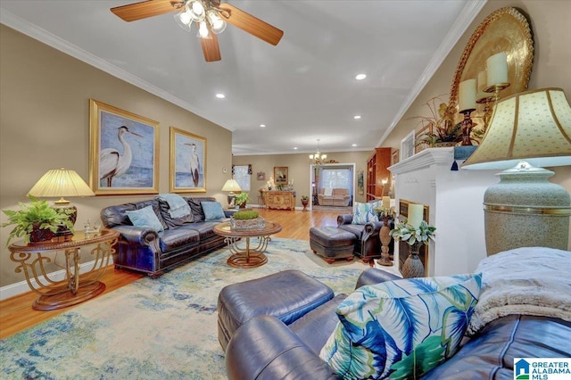 617 Golden Eagle Cir, Jasper, AL 35504 - living room with a chandelier, wood finished floors, ornamental molding, ceiling fan, and recessed lighting