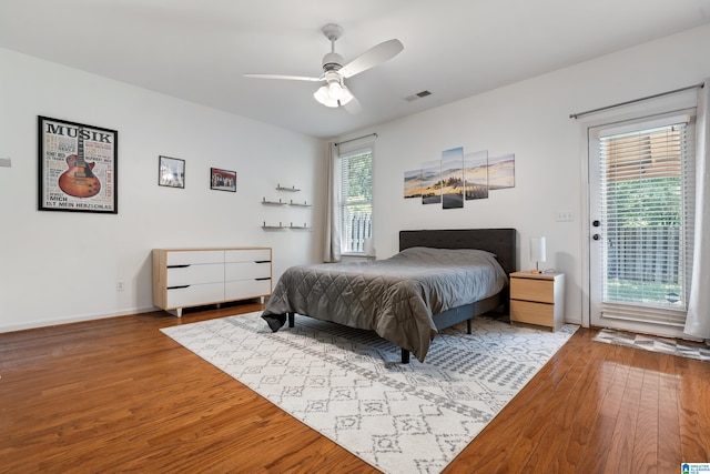 5846 Water Branch Rd, Hoover, AL 35244 - bedroom with wood finished floors, access to outside, a ceiling fan, and baseboards