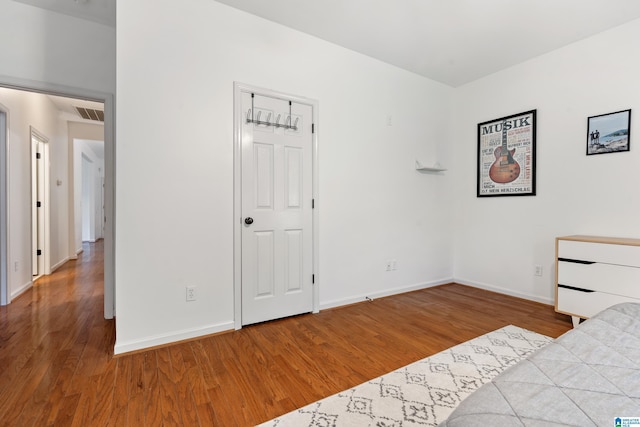 5846 Water Branch Rd, Hoover, AL 35244 - bedroom featuring wood finished floors and baseboards