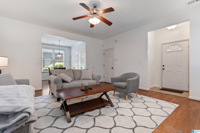 5846 Water Branch Rd, Hoover, AL 35244 - living room with wood finished floors, ceiling fan, and baseboards