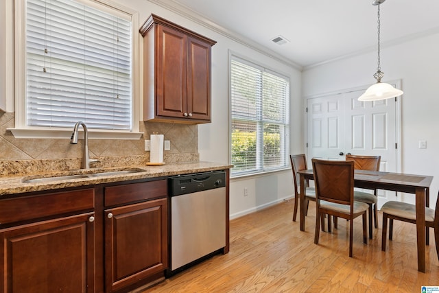 5846 Water Branch Rd, Hoover, AL 35244 - kitchen with dishwasher, a sink, light wood-style flooring, tasteful backsplash, and ornamental molding