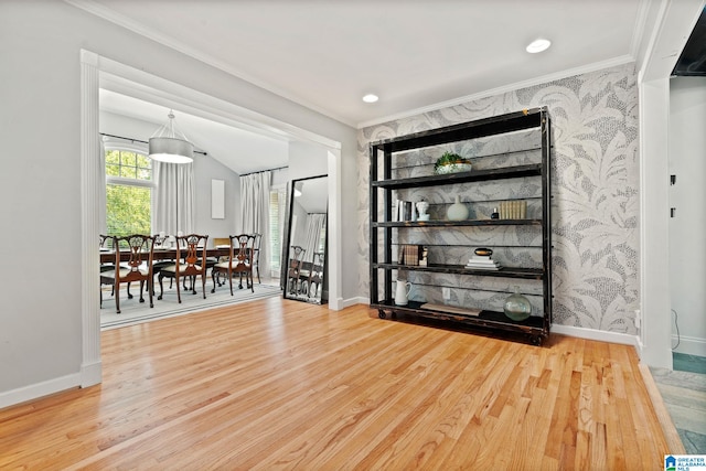 3208 N Woodridge Rd, Mountain Brook, AL 35223 - dining area with crown molding, wood finished floors, and baseboards