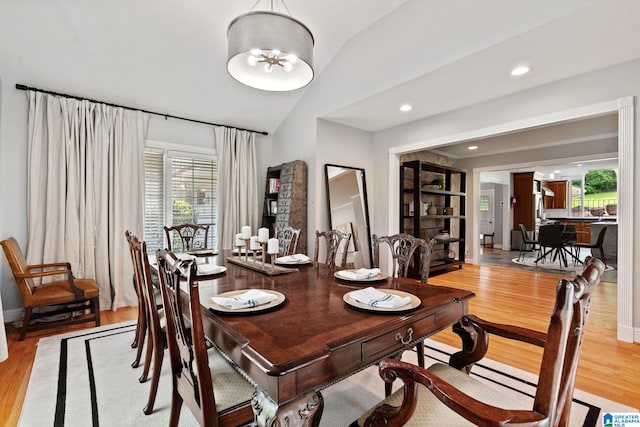 3208 N Woodridge Rd, Mountain Brook, AL 35223 - dining area featuring lofted ceiling, healthy amount of natural light, wood finished floors, recessed lighting, and baseboards