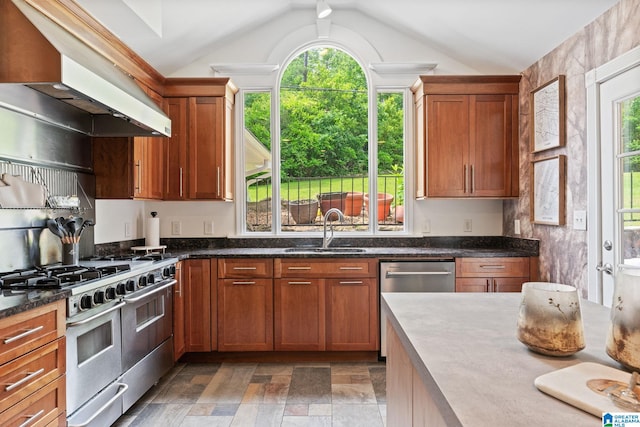 3208 N Woodridge Rd, Mountain Brook, AL 35223 - kitchen with a sink, range hood, appliances with stainless steel finishes, light stone finish floors, and lofted ceiling