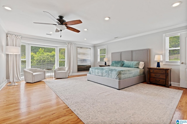 3208 N Woodridge Rd, Mountain Brook, AL 35223 - bedroom with ornamental molding, multiple windows, recessed lighting, light wood-style floors, and ceiling fan
