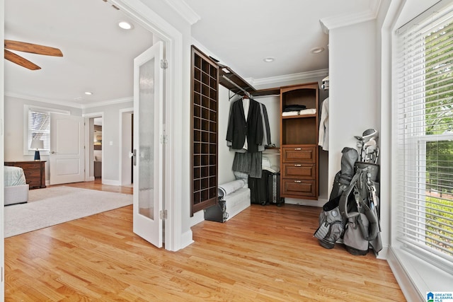 3208 N Woodridge Rd, Mountain Brook, AL 35223 - walk in closet with a ceiling fan and wood finished floors