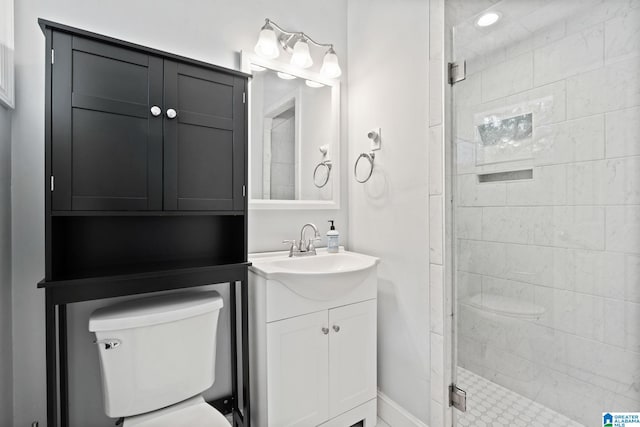 3208 N Woodridge Rd, Mountain Brook, AL 35223 - bathroom with toilet, vanity, and a stall shower