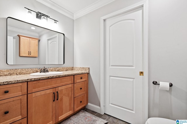 3208 N Woodridge Rd, Mountain Brook, AL 35223 - half bath with crown molding, vanity, toilet, and baseboards