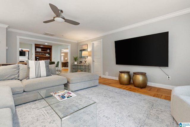 3208 N Woodridge Rd, Mountain Brook, AL 35223 - living area with ornamental molding, ceiling fan, and baseboards