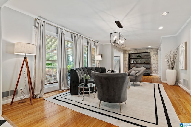3208 N Woodridge Rd, Mountain Brook, AL 35223 - living room featuring ornamental molding, wood finished floors, baseboards, a chandelier, and recessed lighting