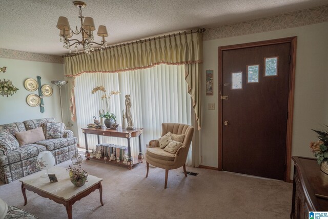 3332 Berry Dr, Hueytown, AL 35023 - living area with a chandelier, light carpet, and a textured ceiling