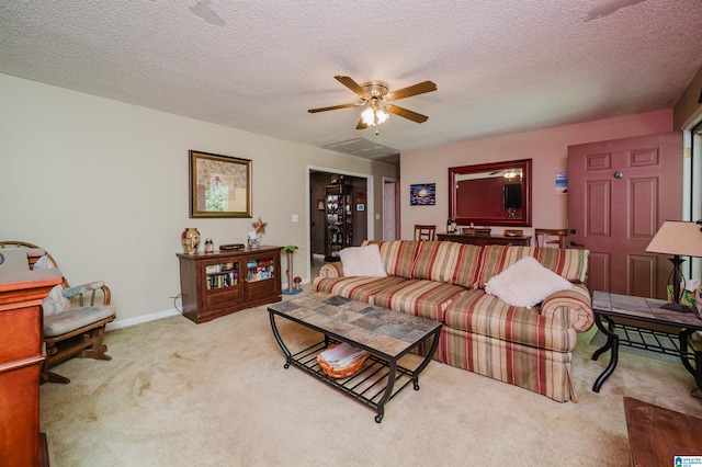3628 Oscar Bradford Rd, Hayden, AL 35079 - living area featuring carpet, ceiling fan, and a textured ceiling