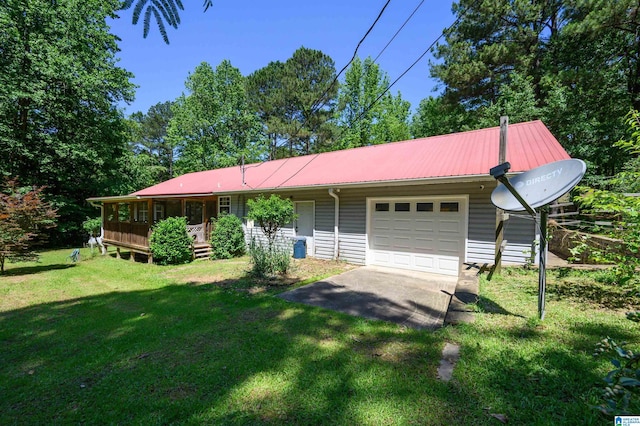 3628 Oscar Bradford Rd, Hayden, AL 35079 - single story home featuring a front lawn, an attached garage, metal roof, and driveway