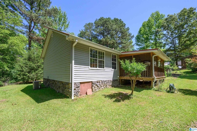 3628 Oscar Bradford Rd, Hayden, AL 35079 - view of side of home with central AC unit and a yard