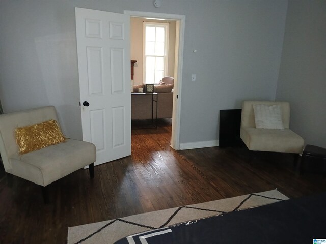 2120 Brewster Rd, Birmingham, AL 35235 - sitting room with wood finished floors and baseboards