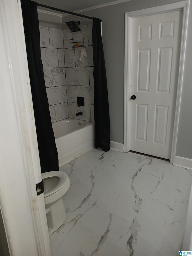 2120 Brewster Rd, Birmingham, AL 35235 - full bath with marble look tiles, toilet, shower / tub combo with curtain, and baseboards
