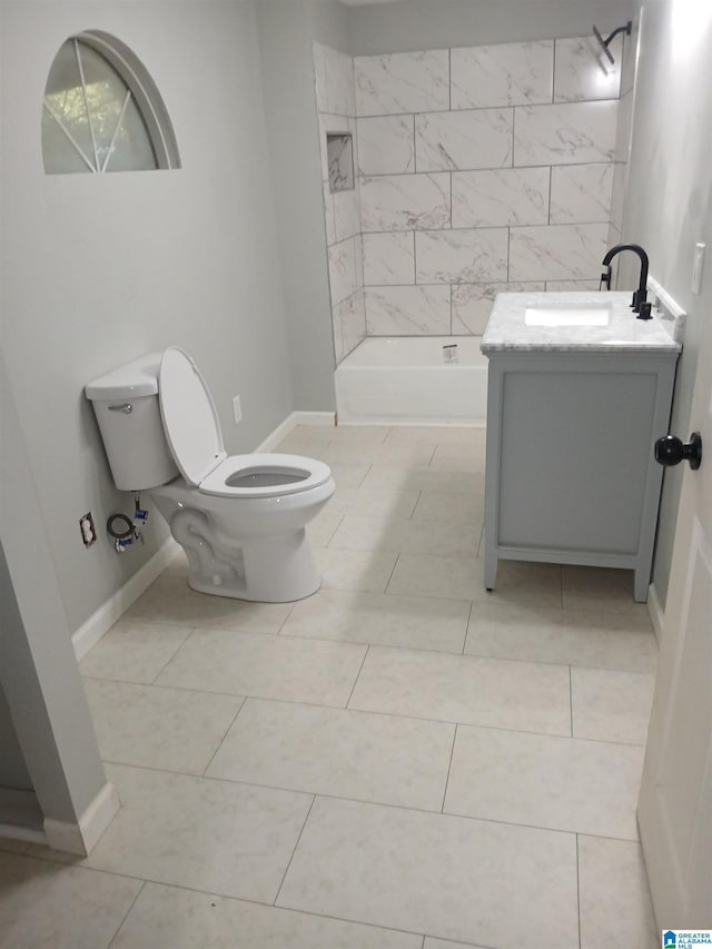 2120 Brewster Rd, Birmingham, AL 35235 - full bathroom featuring toilet, vanity, baseboards, and tile patterned floors