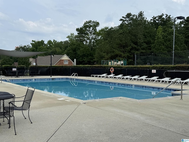 1206 Savannah Ln, Calera, AL 35040 - community pool featuring a patio area