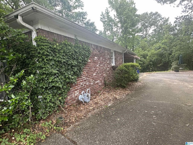 400 Shiloh Cir, Birmingham, AL 35213 - view of side of home with brick siding and asphalt driveway