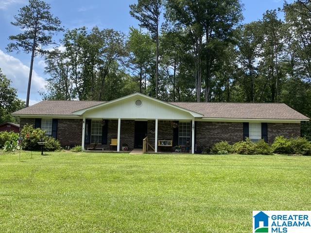 5769 Eastern Valley Rd, Mccalla, AL 35111 - ranch-style home with a front yard and a porch