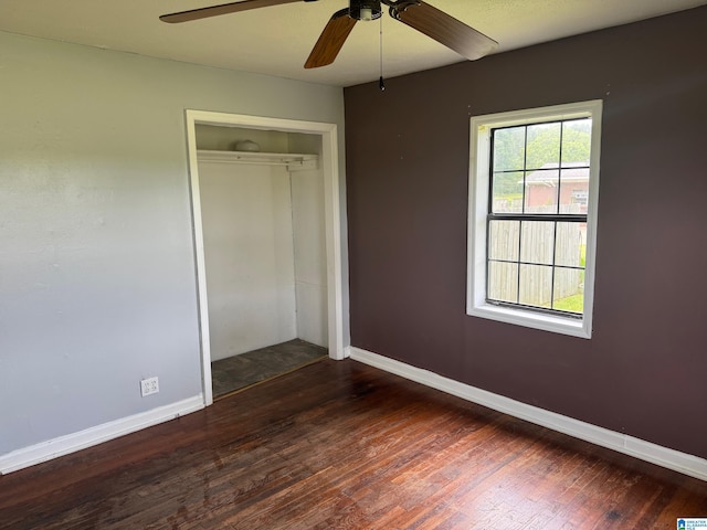1015 Anderson Rd, Gadsden, AL 35901 - unfurnished bedroom with hardwood / wood-style floors, a closet, baseboards, and ceiling fan