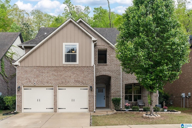 5432 Park Side Cir, Hoover, AL 35244 - traditional-style home with board and batten siding, roof with shingles, driveway, and brick siding