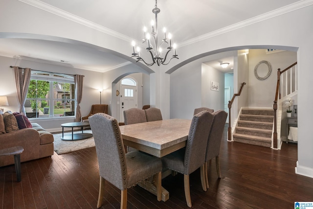 5432 Park Side Cir, Hoover, AL 35244 - dining area with arched walkways, dark wood-type flooring, a chandelier, stairway, and ornamental molding