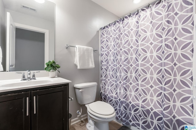 5432 Park Side Cir, Hoover, AL 35244 - full bathroom with toilet, vanity, a shower with shower curtain, and baseboards