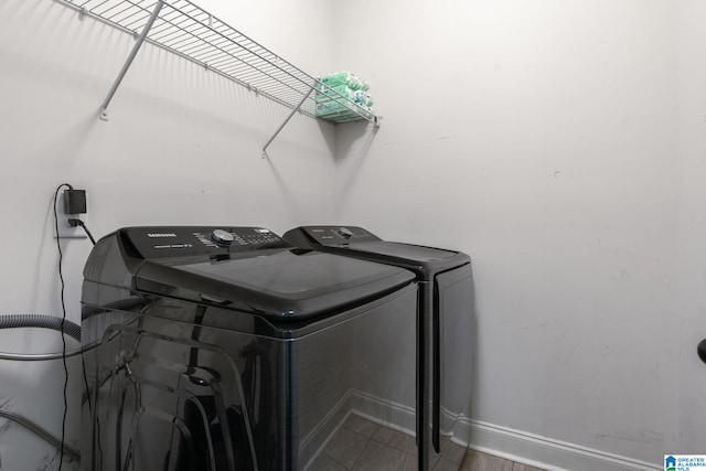 5432 Park Side Cir, Hoover, AL 35244 - laundry room featuring washing machine and dryer and baseboards