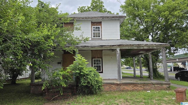 101 W 17th St, Anniston, AL 36201 - view of front of property featuring a shingled roof and a porch