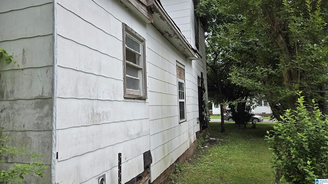 101 W 17th St, Anniston, AL 36201 - view of home's exterior featuring a yard