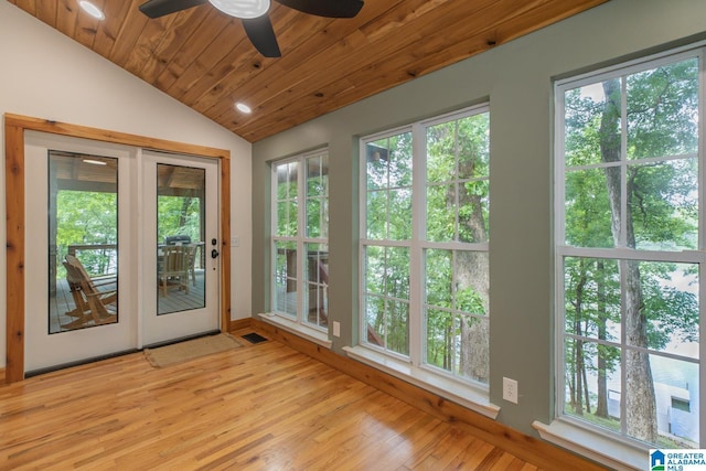 1794 Riverknolle Rd, Tallassee, AL 36078 - unfurnished sunroom featuring lofted ceiling, healthy amount of natural light, wood finished floors, and wood ceiling