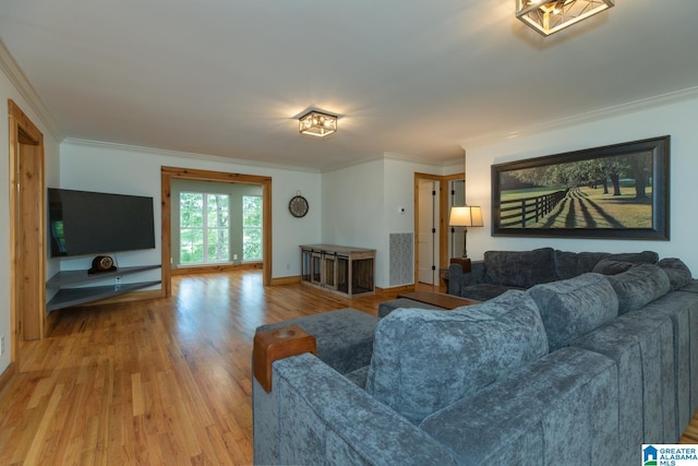 1794 Riverknolle Rd, Tallassee, AL 36078 - living room featuring wood finished floors, ornamental molding, and baseboards