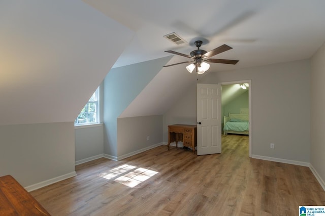 1794 Riverknolle Rd, Tallassee, AL 36078 - additional living space featuring a ceiling fan, wood finished floors, baseboards, and vaulted ceiling